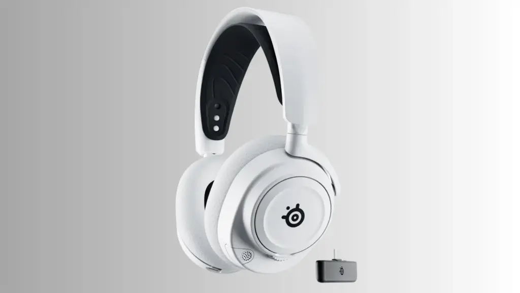 SteelSeries Arctis Nova 7X wireless gaming headset resting on a desk next to a gaming controller with neutral background