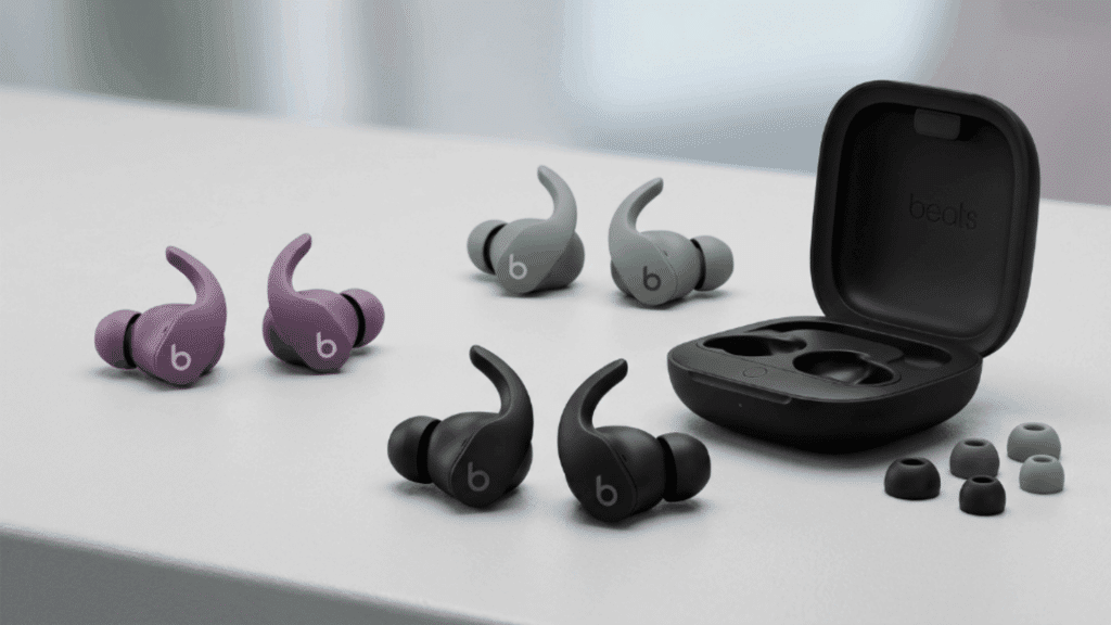 beats Fit Pro earbuds in multiple colors with charging case and ear tips displayed on a clean surface