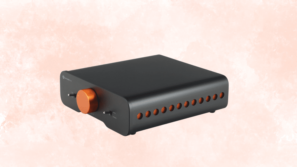 fosi audio za3 balanced home audio amplifier in black featuring a large orange volume knob and stereo-mono toggle switches on a plain background