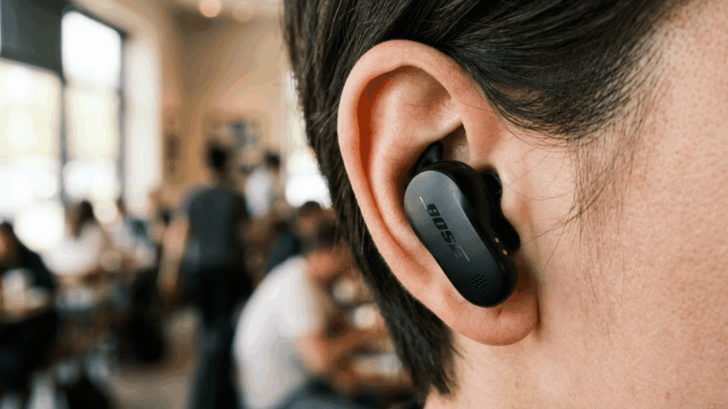 person wearing a Bose wireless earbud showing compact in-ear design suitable for comfortable daily use. 