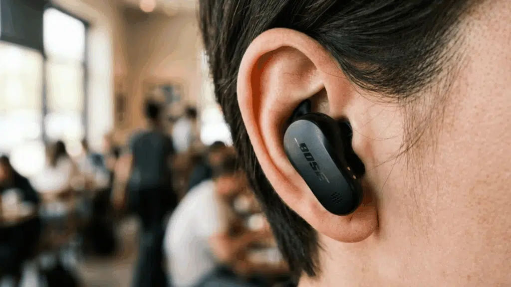person wearing a Bose wireless earbud showing compact in-ear design suitable for comfortable daily use. 