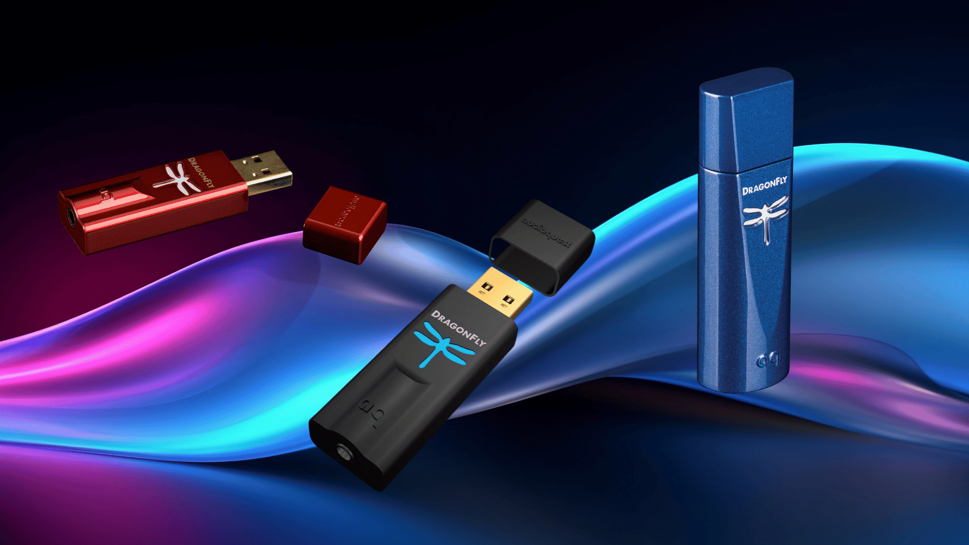 three sleek dragonfly usb dacs in red, black, and blue colors are displayed against a vibrant, wavy neon background.