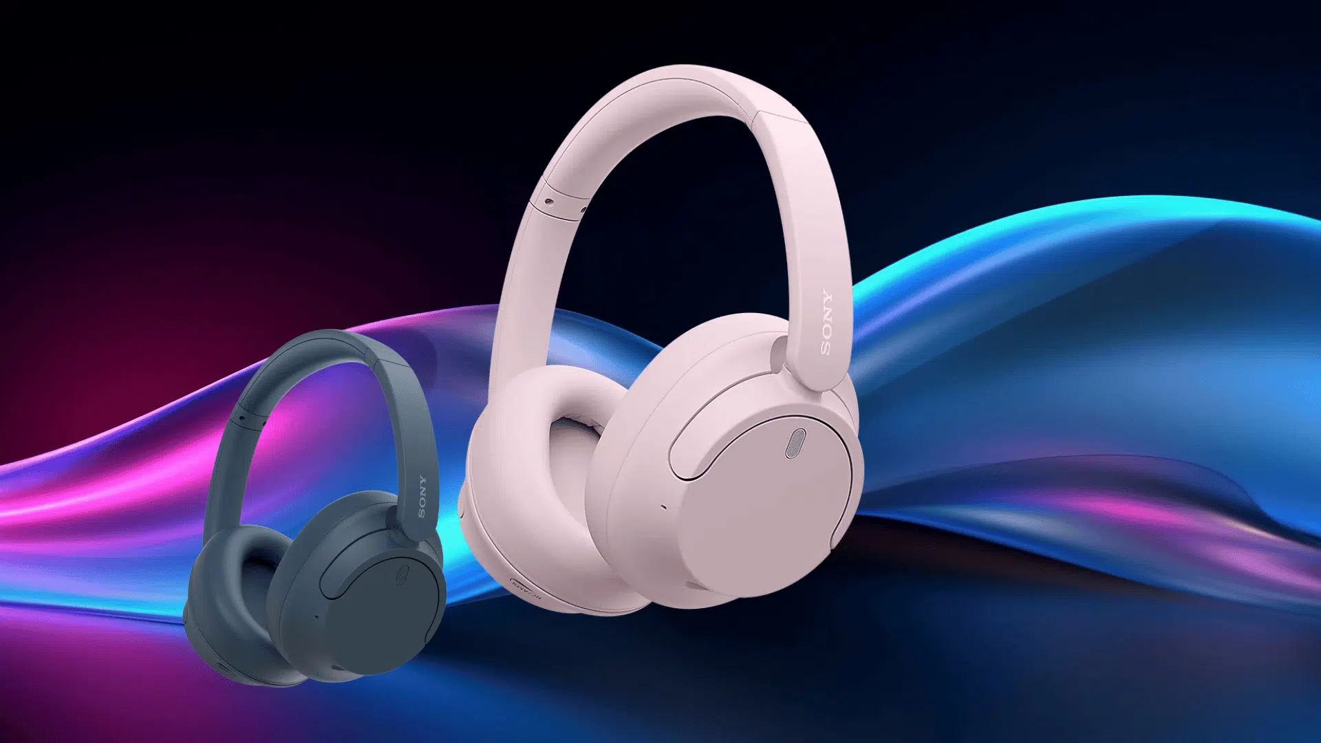 two Sony WH-CH720N wireless headphones in pink and dark blue displayed against a colorful flowing light background.
