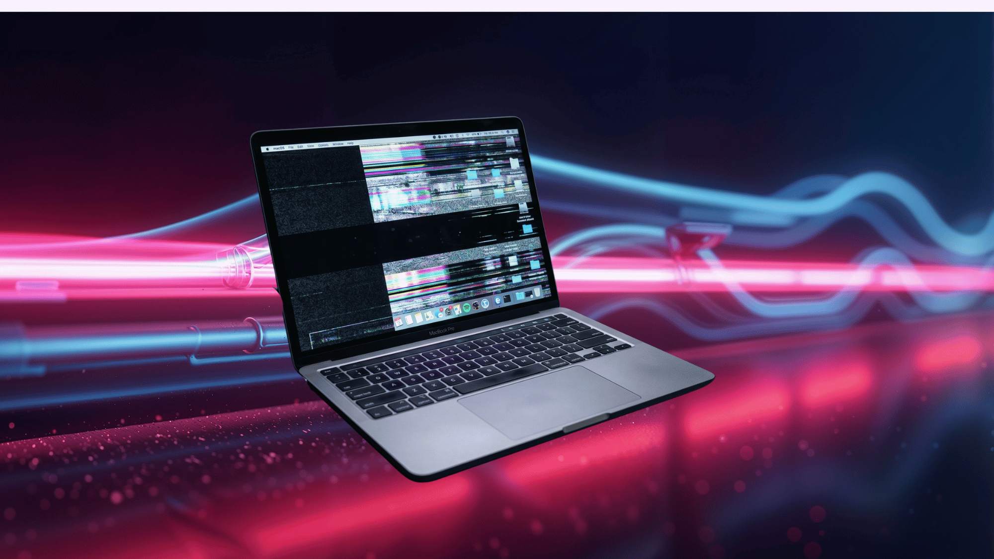 MacBook pro with flickering screen glitch effect and partial black display