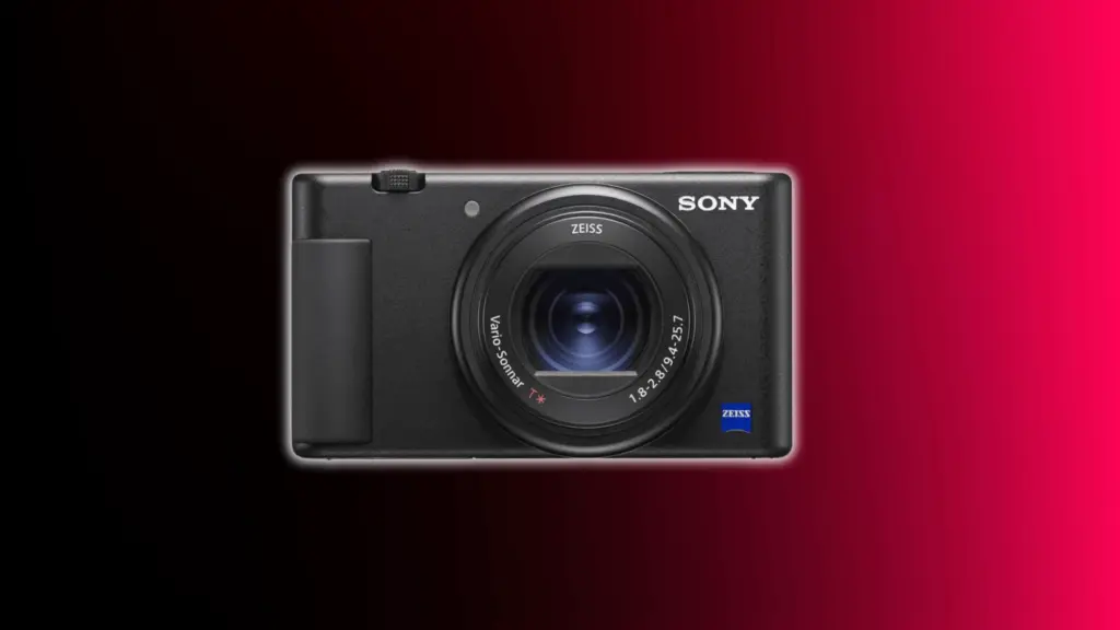 Sony ZV-1 compact vlogging camera with flip screen and zoom lens shown against a black and red gradient background