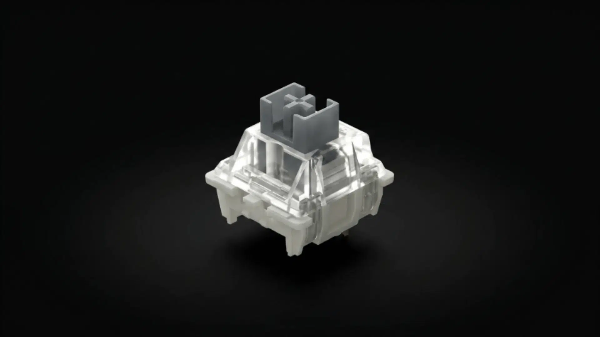 g pro 3.0 silvery switch close view with clear housing and silver stem placed on minimal clean surface