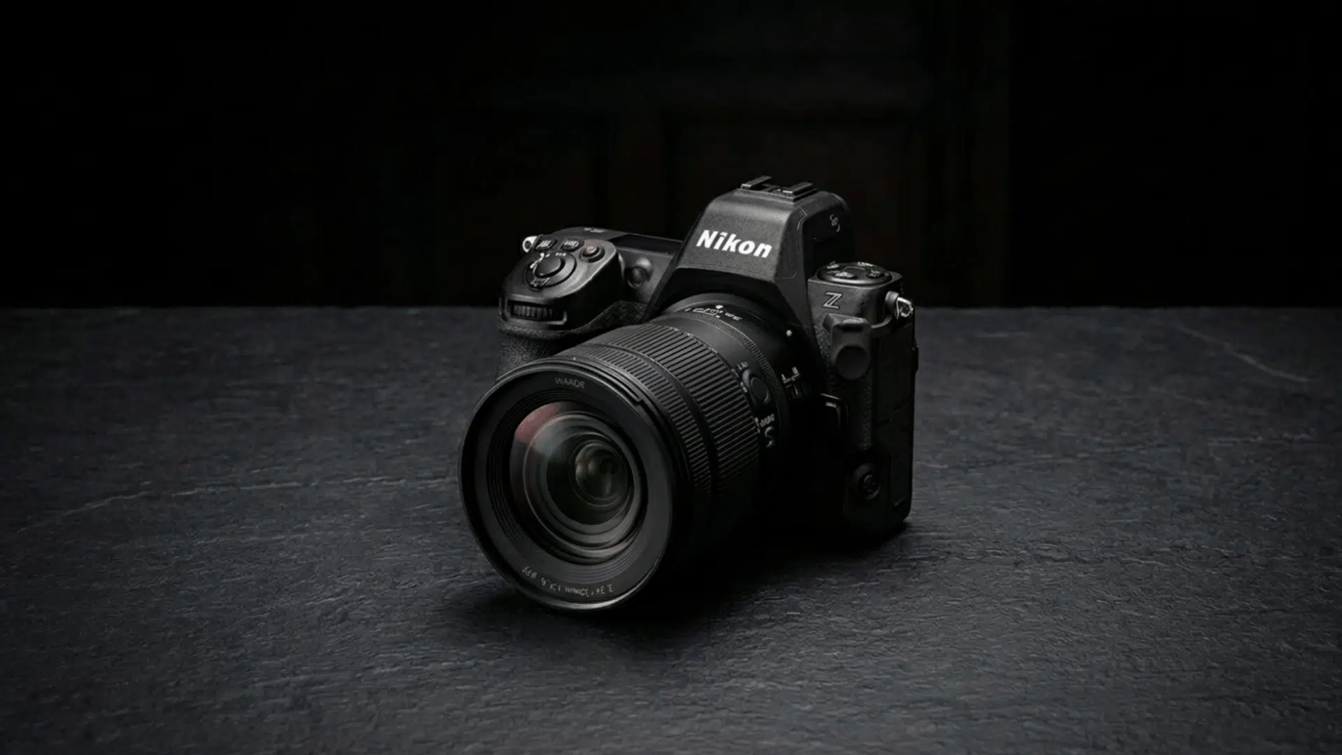 nikon z 8 camera on black surface with dark background and dramatic studio lighting setup