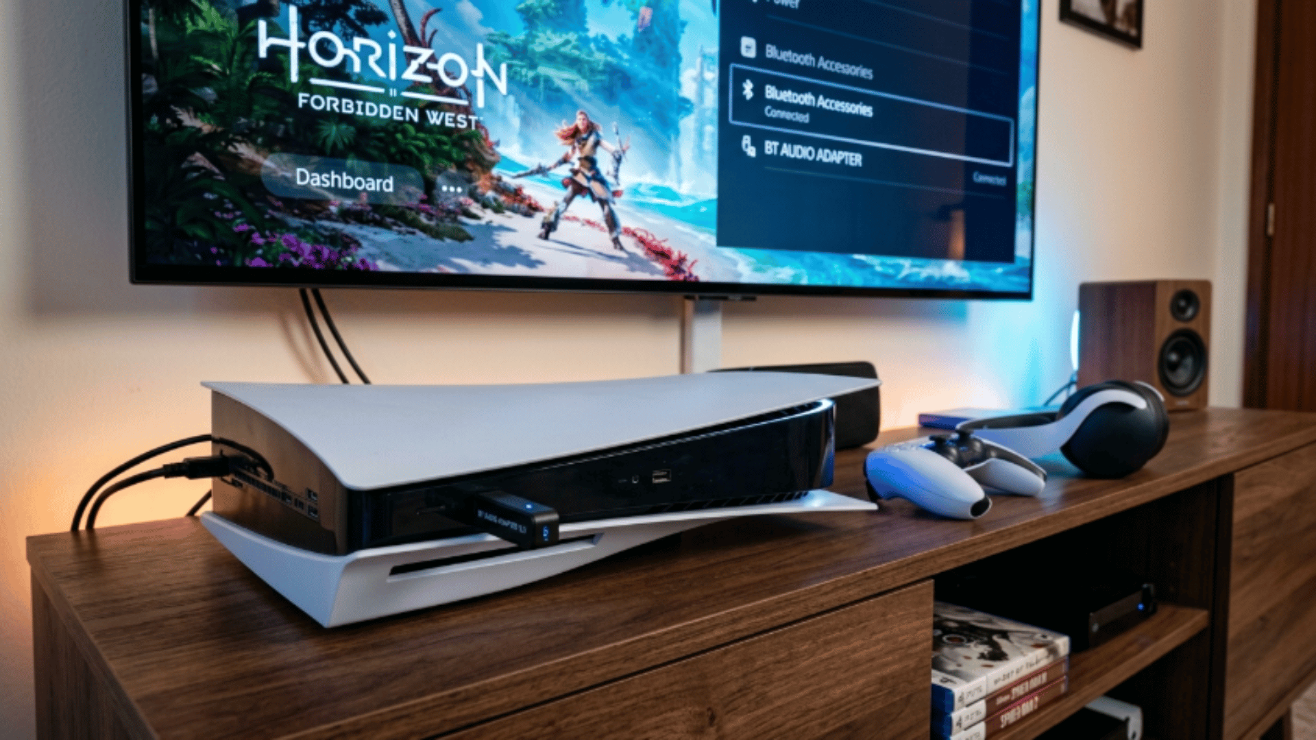 pS5 connected to a TV with Bluetooth settings open and headphones nearby, showing setup for wireless audio connection