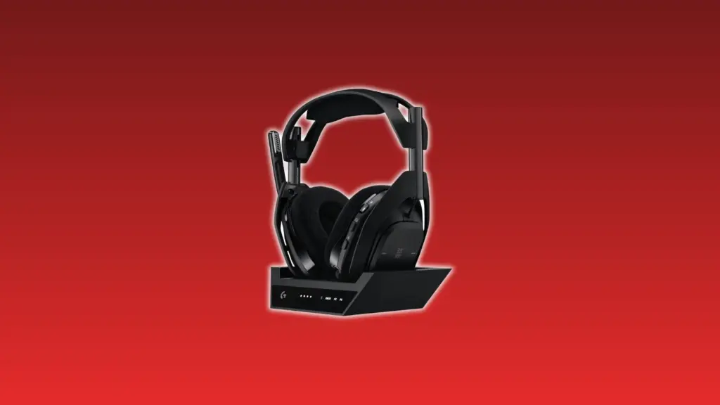 Astro A50 X wireless gaming headset with fabric ear cushions, adjustable headband, and base station dock on a red gradient background