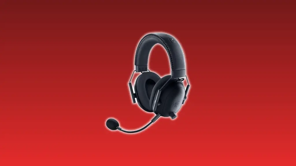 Razer BlackShark V2 Pro wireless gaming headset with fabric ear cups, adjustable headband, and detachable boom microphone on a red background