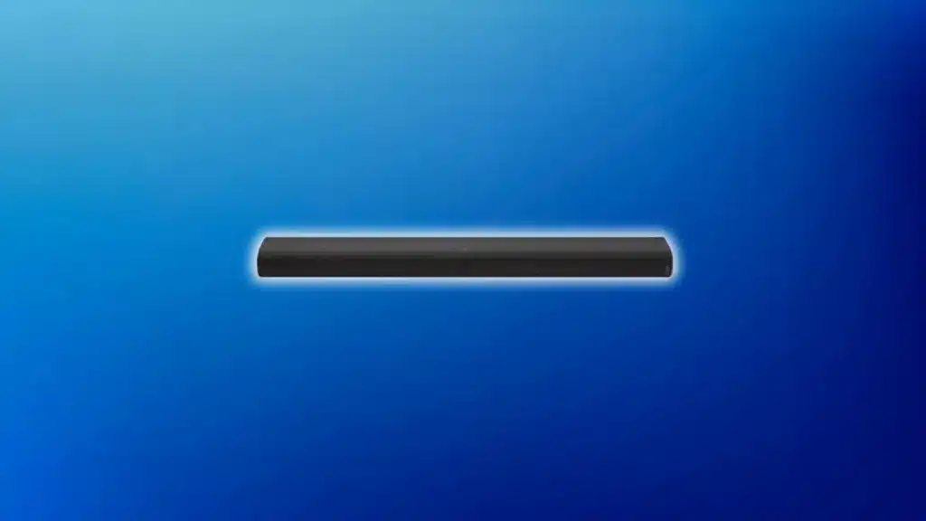 Slim black soundbar with a rounded design and subtle top control icons, centered on a blue gradient background with a soft glow around it.
