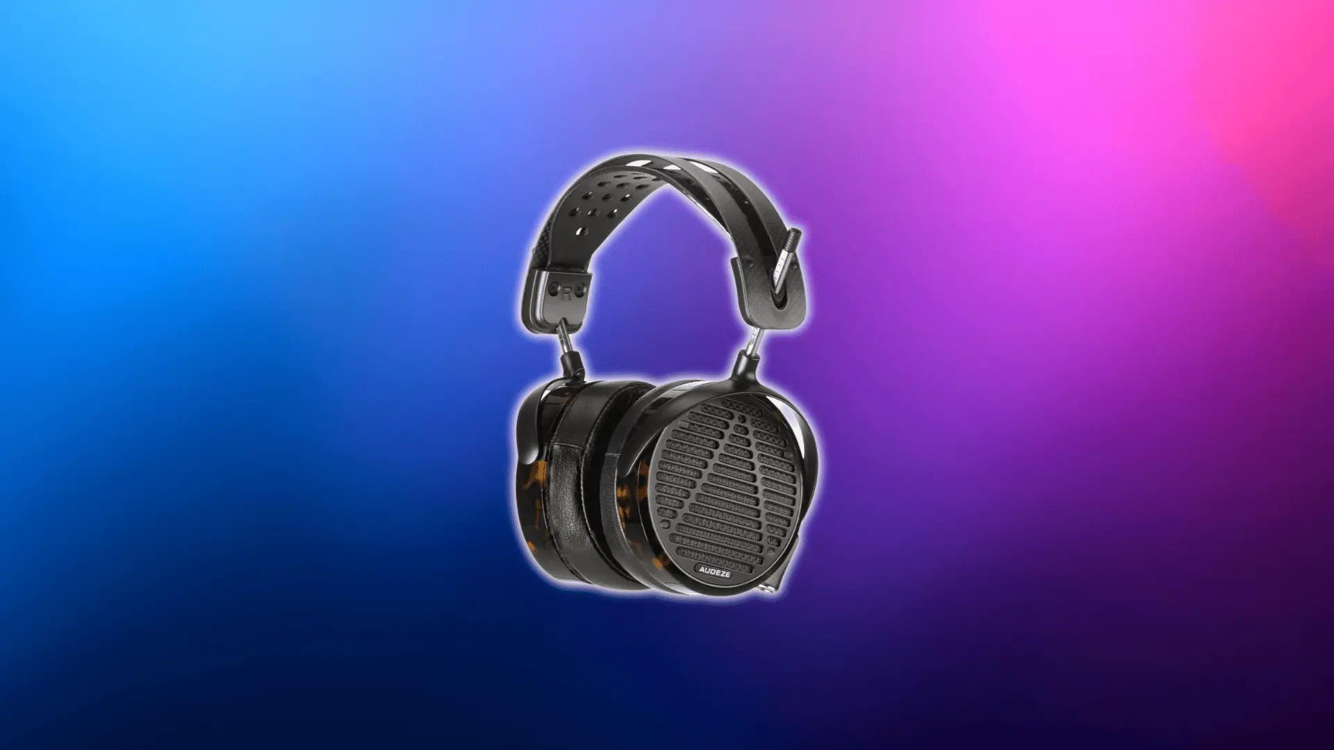 Audeze LCD-5 planar magnetic audiophile headphones on a blue and pink gradient background.