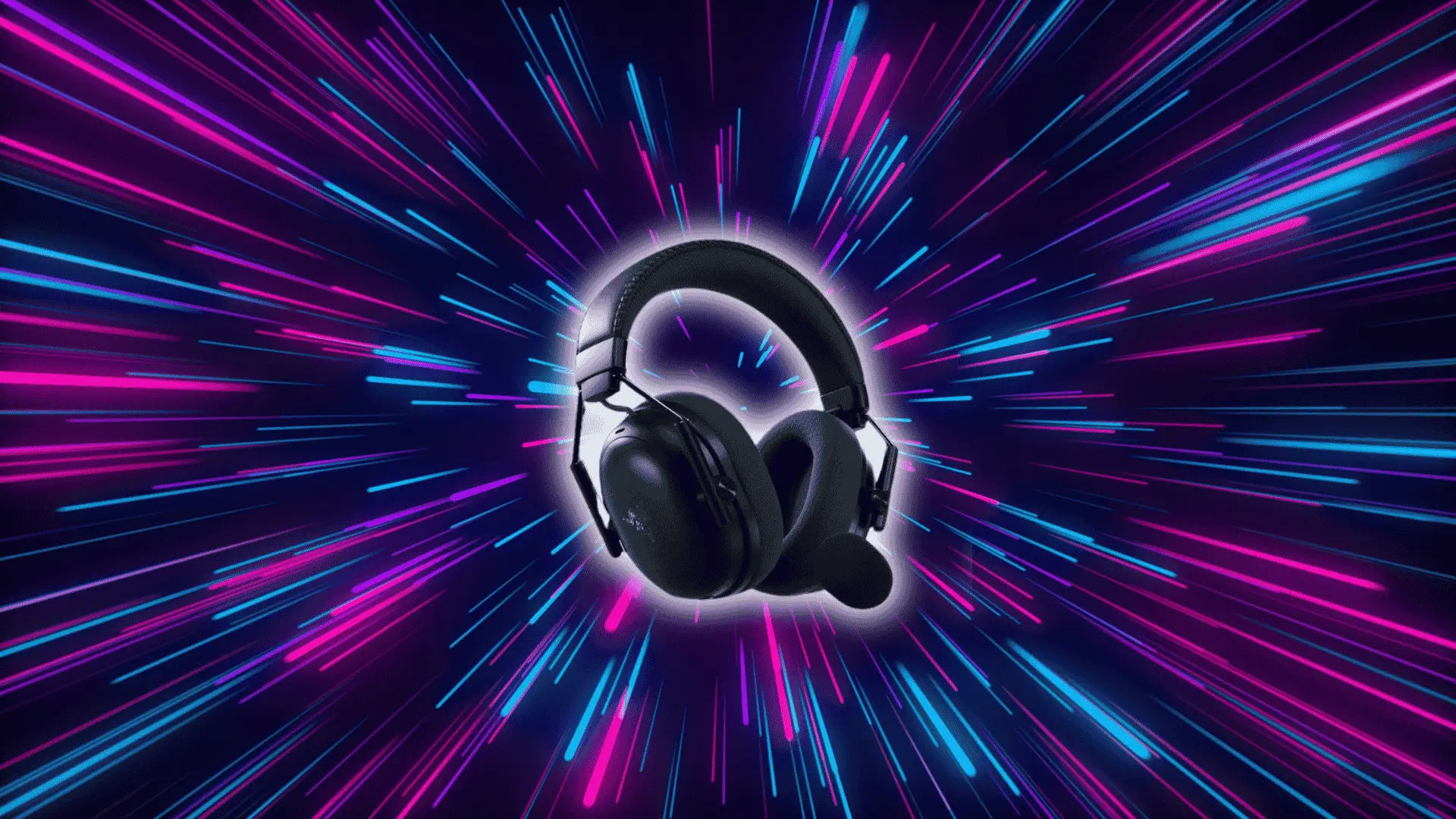 Black Razer BlackShark V3 Pro gaming headset centered with neon pink and blue light streak background radiating outward