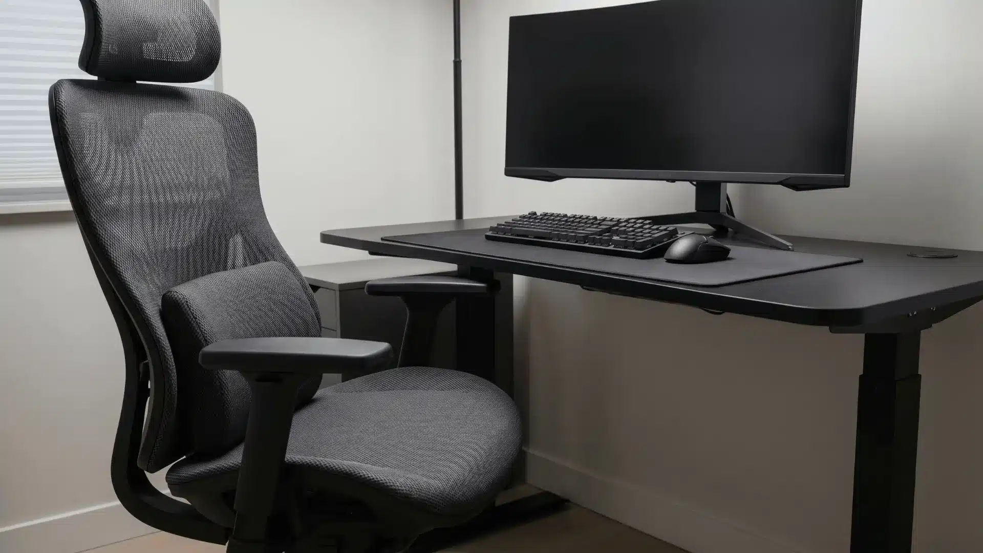 Ergonomic chair with lumbar support positioned correctly at a desk setup