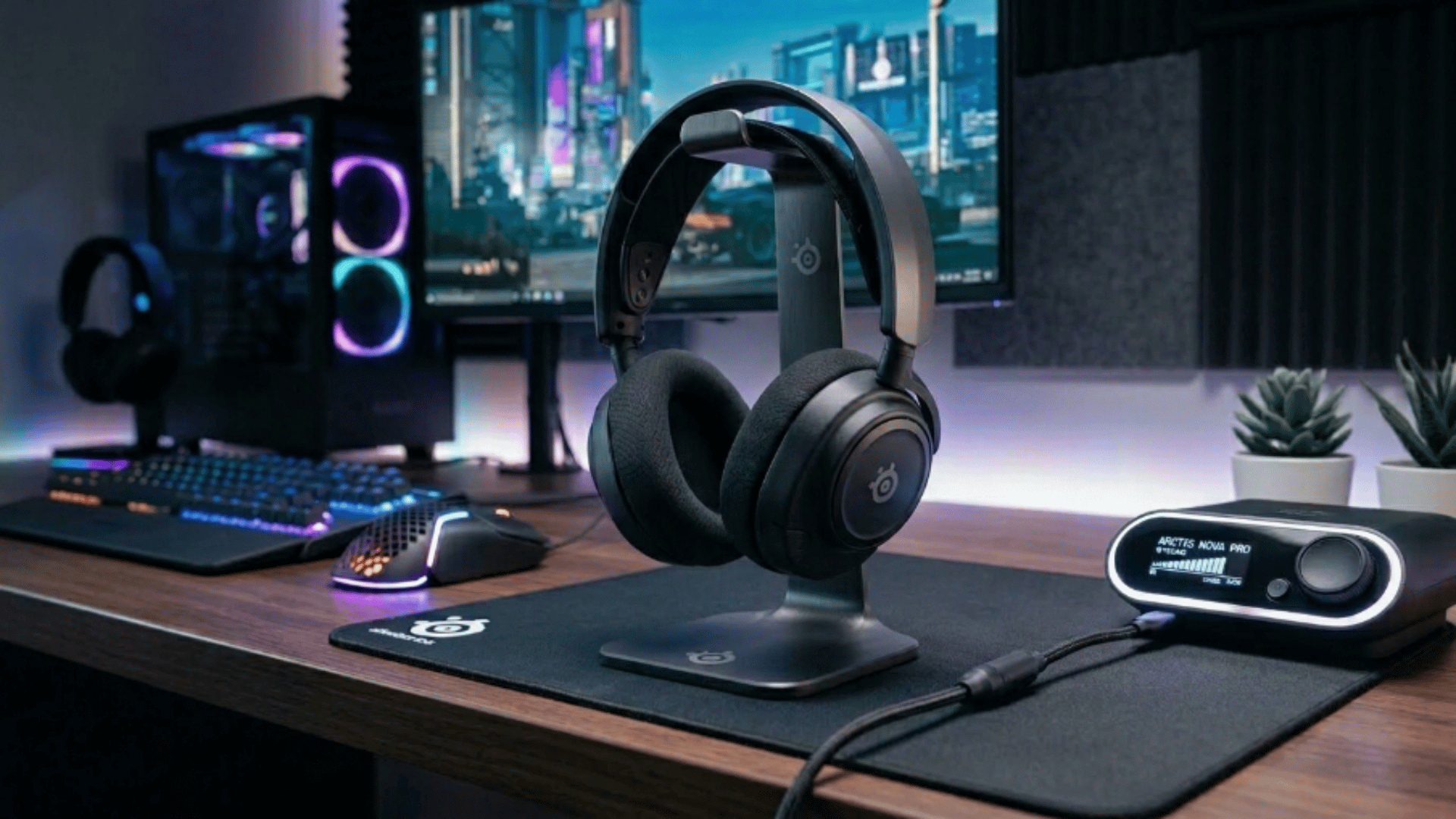 gaming headset on desk with PC setup, RGB lighting, and monitor showing gameplay, ideal for immersive audio experience