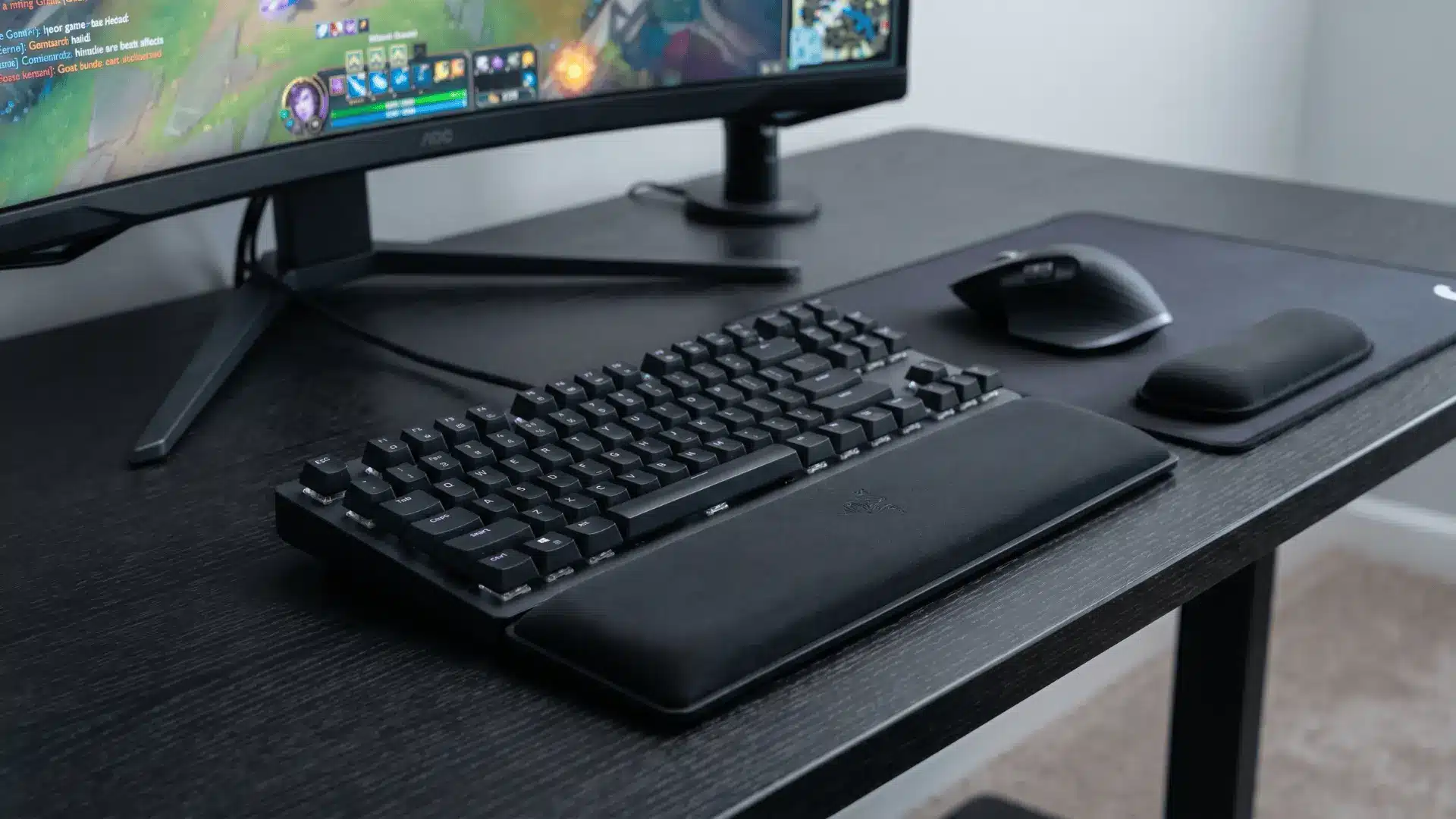 Keyboard and mouse with wrist rests aligned for proper hand support on a desk