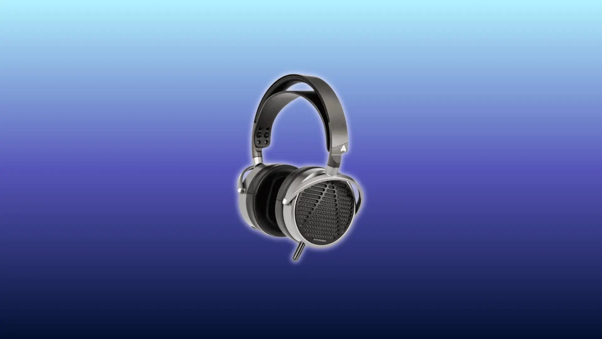 Image of Audeze MM-100 headphones, over-ear open-back planar-magnetic design with silver frame and black ear cups, displayed against a gradient blue background.