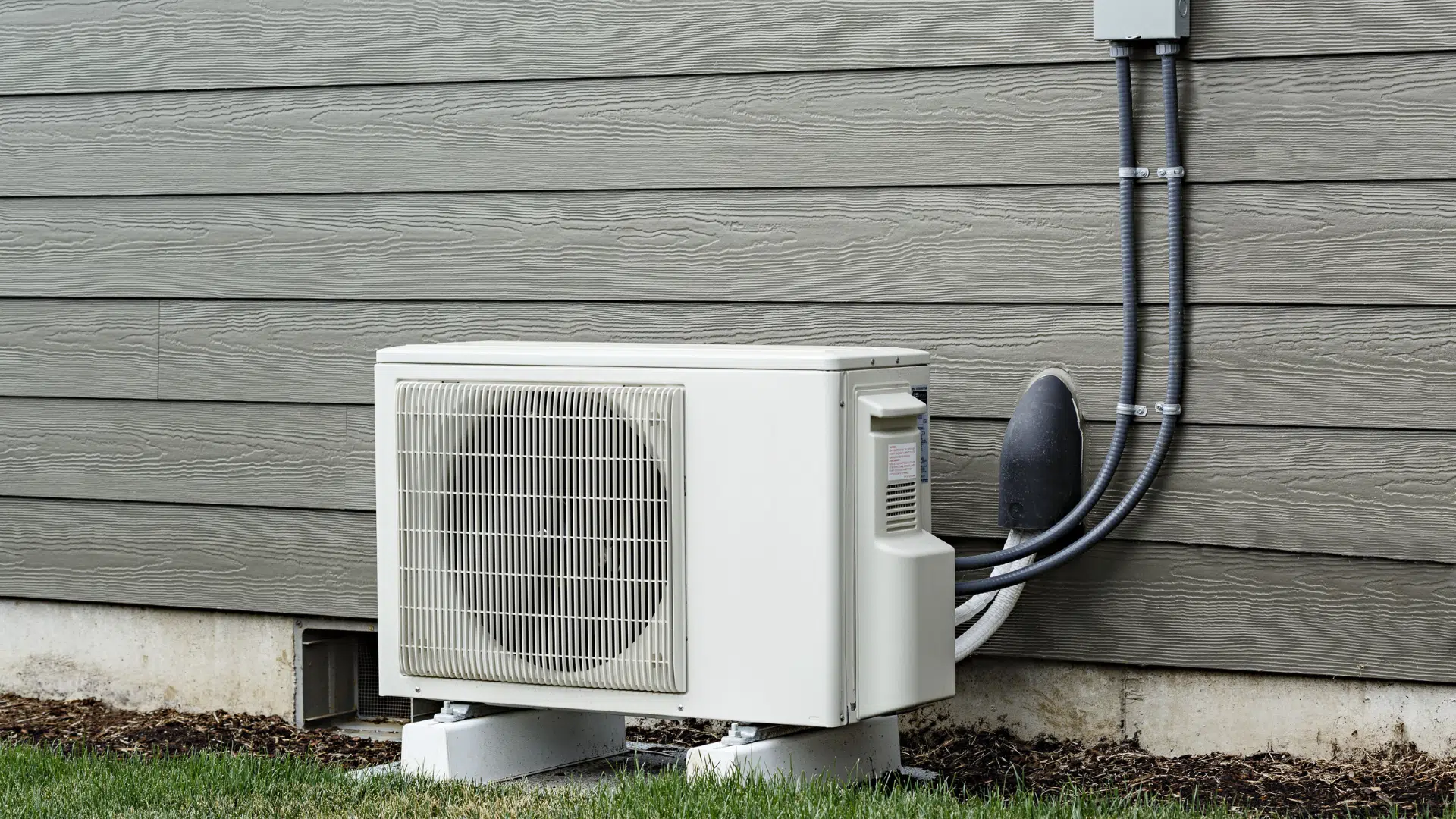 ductless mini split system mounted on a wall for energy efficient room heating and cooling