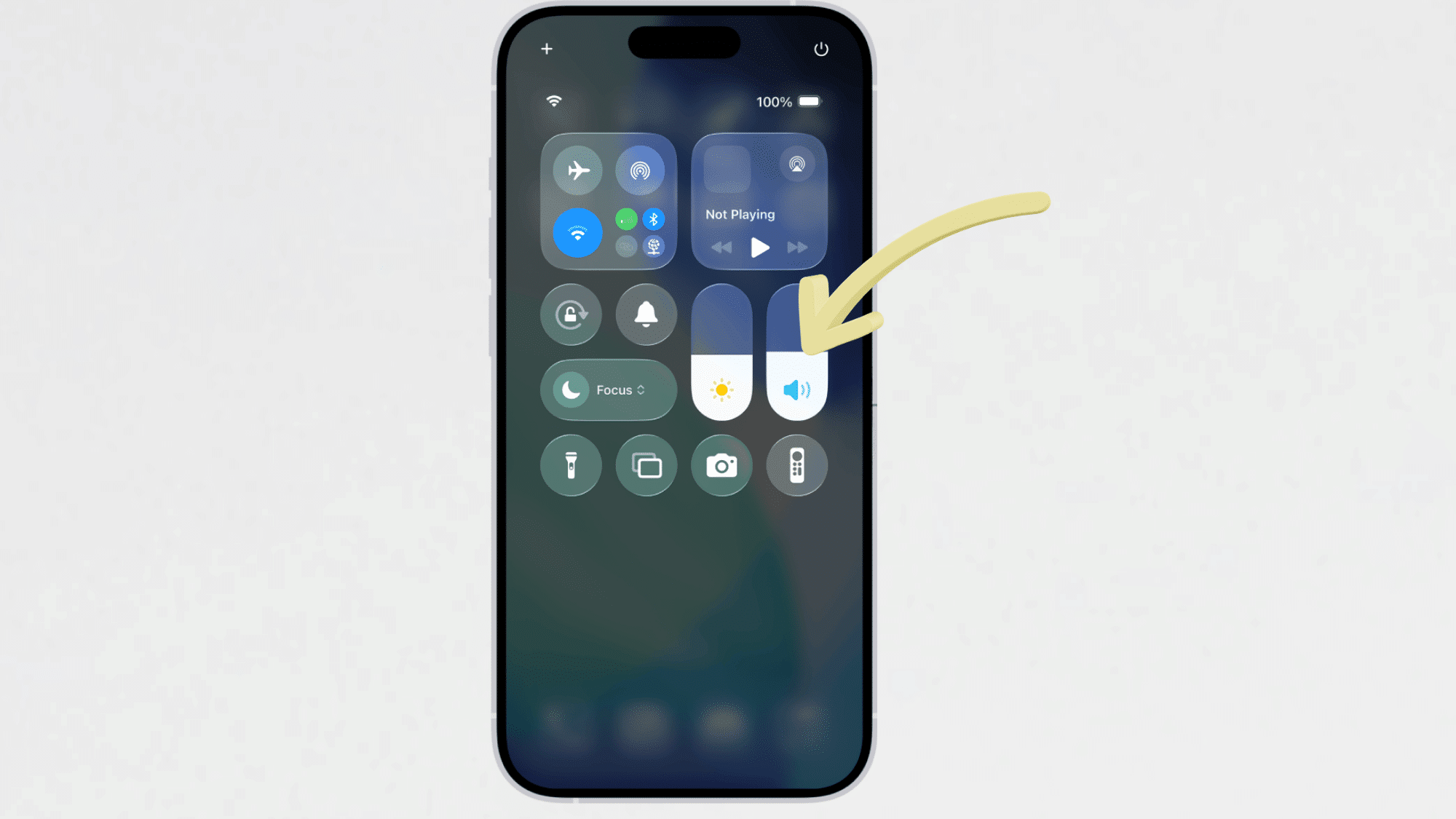 iphone control center showing the volume slider highlighted with a yellow arrow pointing to the sound controls