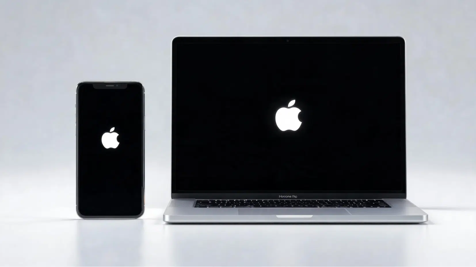 alt text for 60 characters iphone and macbook showing apple logo on white surface