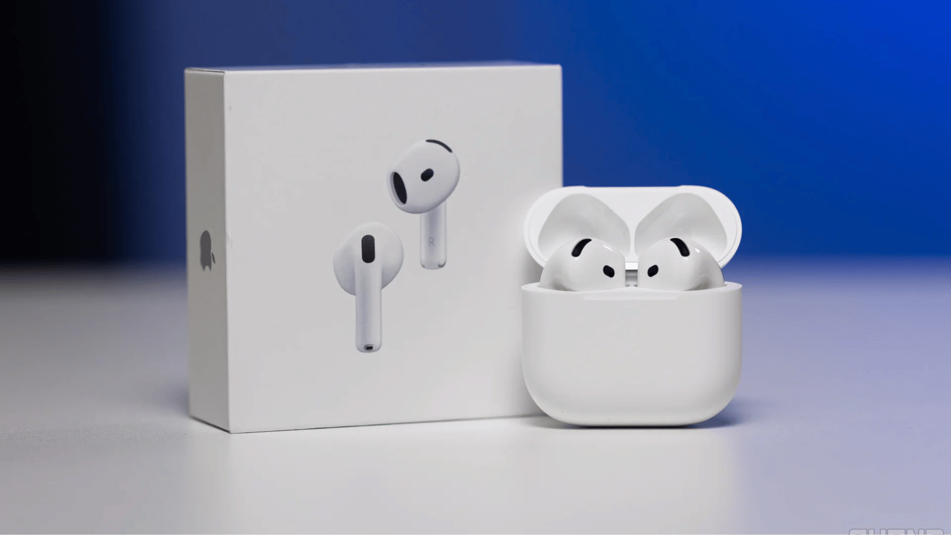 apple airpods 4 with anc with the box kept center alligned on a blurred background