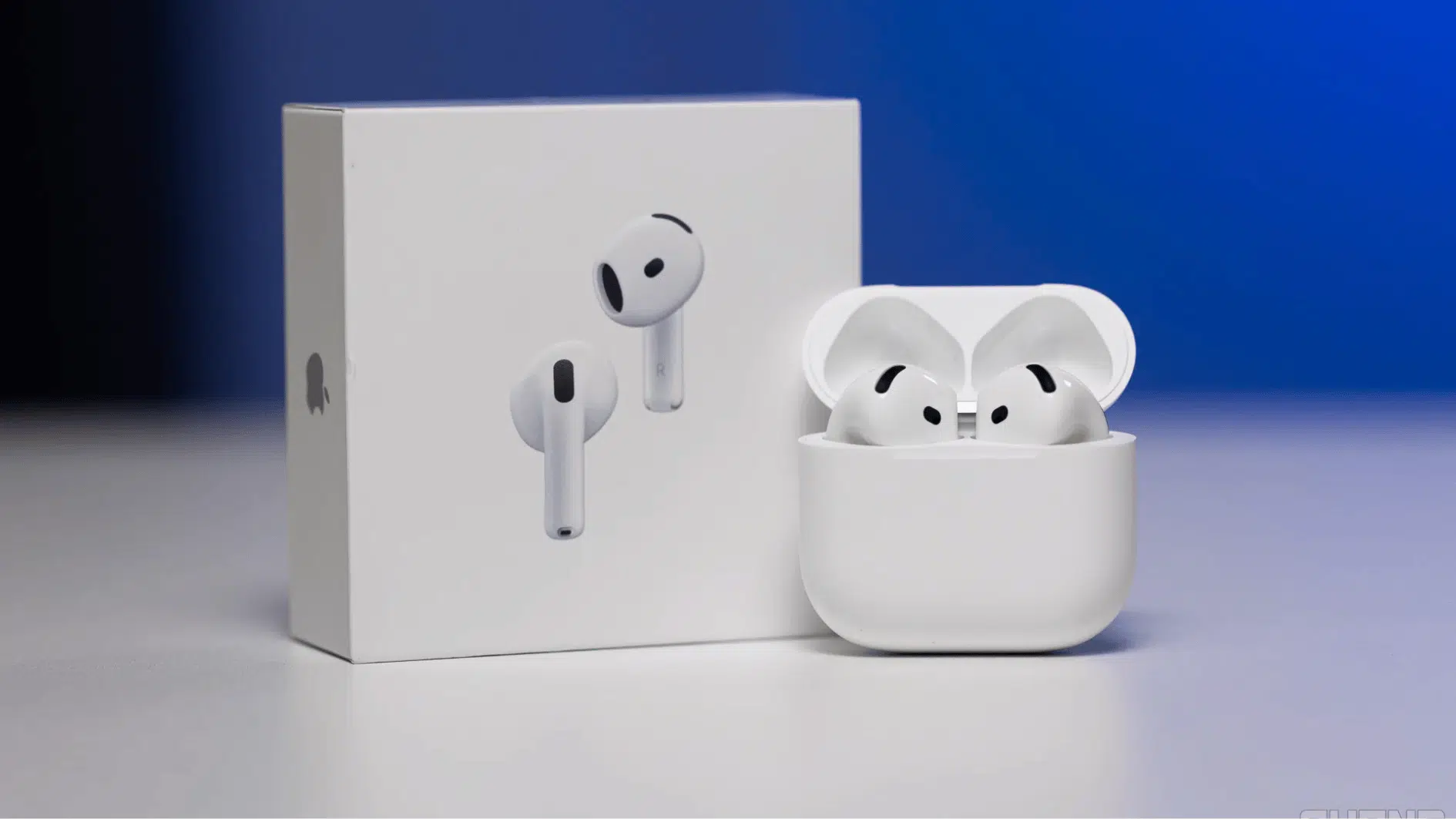 apple airpods 4 with anc with the box kept center alligned on a blurred background