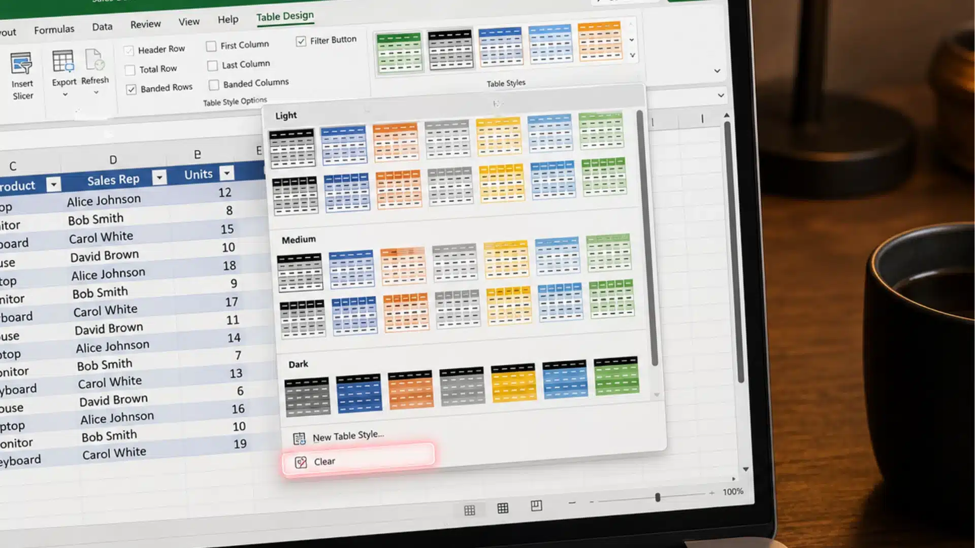 Excel Table Design ribbon with the Clear Table Style option highlighted, showing how to remove formatting