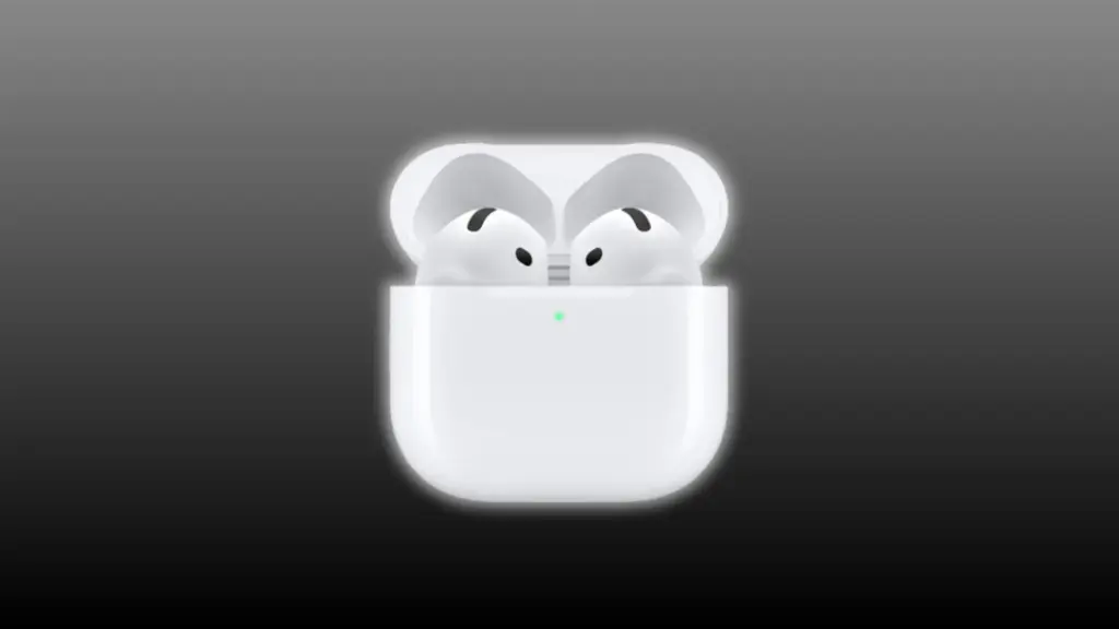 AirPods earbuds inside a charging case with a glowing indicator light showing the charging process.