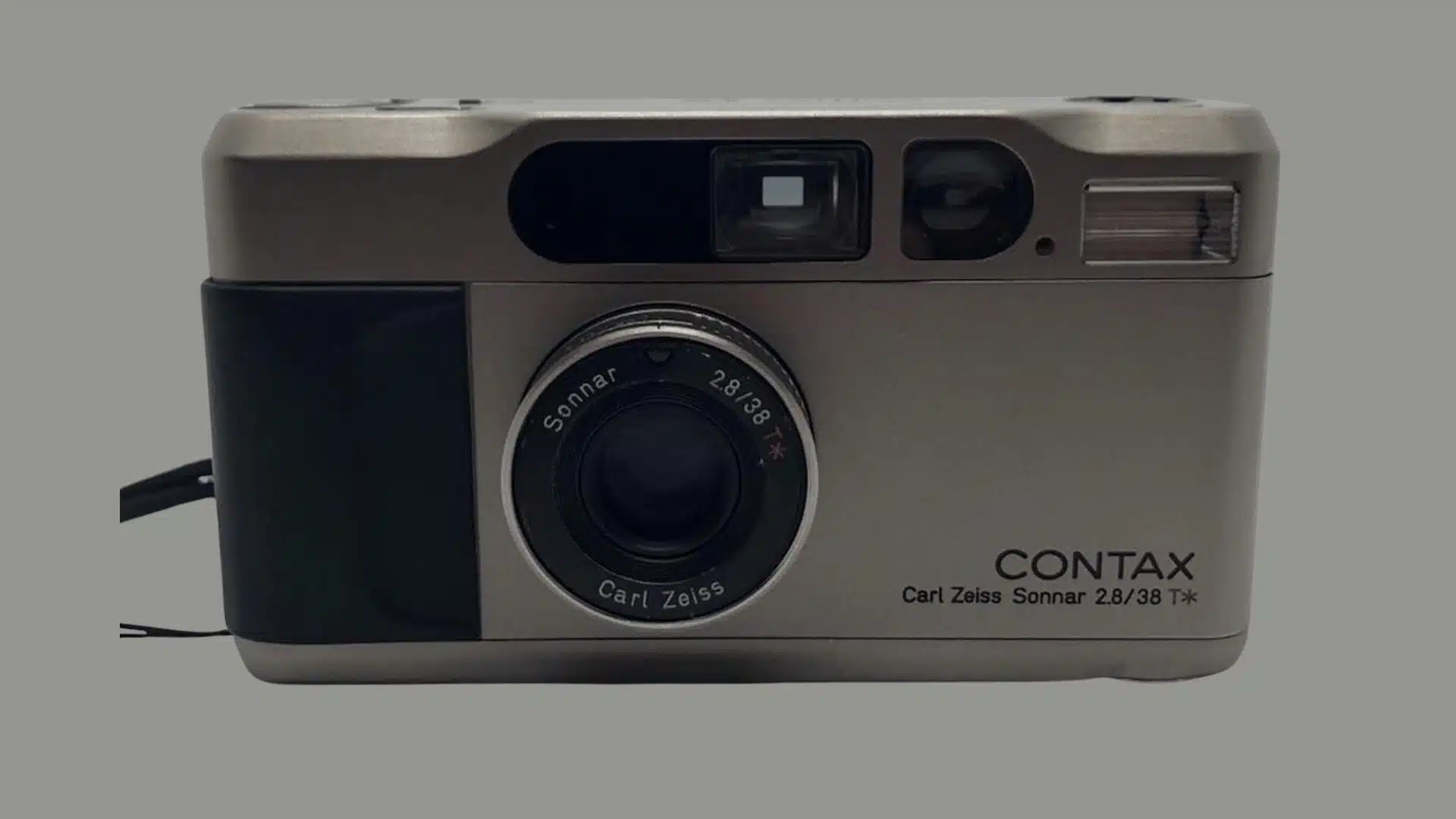 Front view of a silver Contax compact film camera with a Carl Zeiss Sonnar 38mm lens and built-in flash.