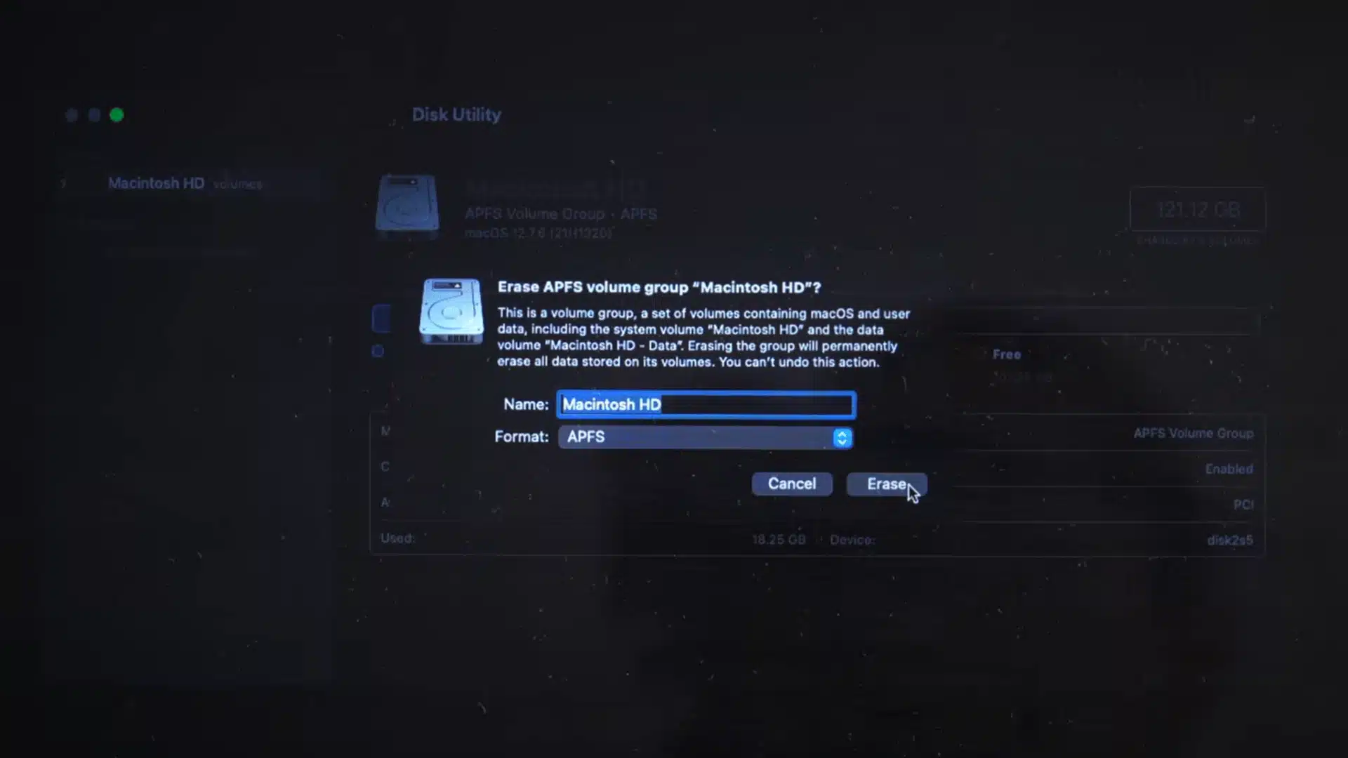 Disk Utility showing Macintosh HD selected with APFS format before erasing the drive