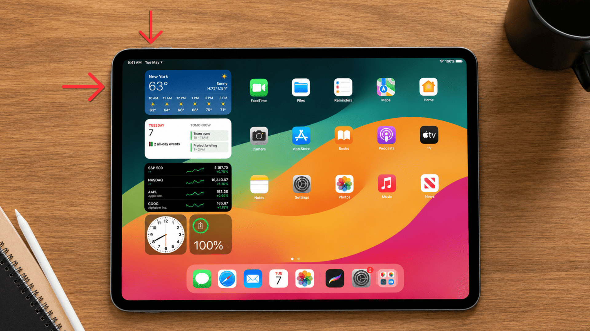 how to screenshot on ipad red arrows show top button and swipe gesture on ipad home screen with wallpaper and widgets