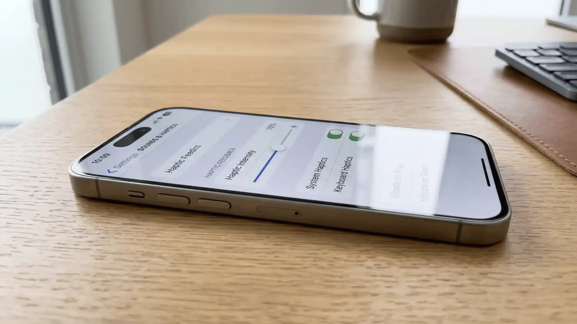 Modern iPhone showing a settings adjustment concept for haptic feedback