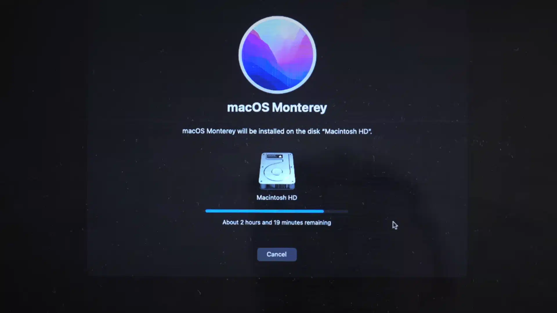 macOS Monterey reinstalling on Macintosh HD with the installation progress bar displayed