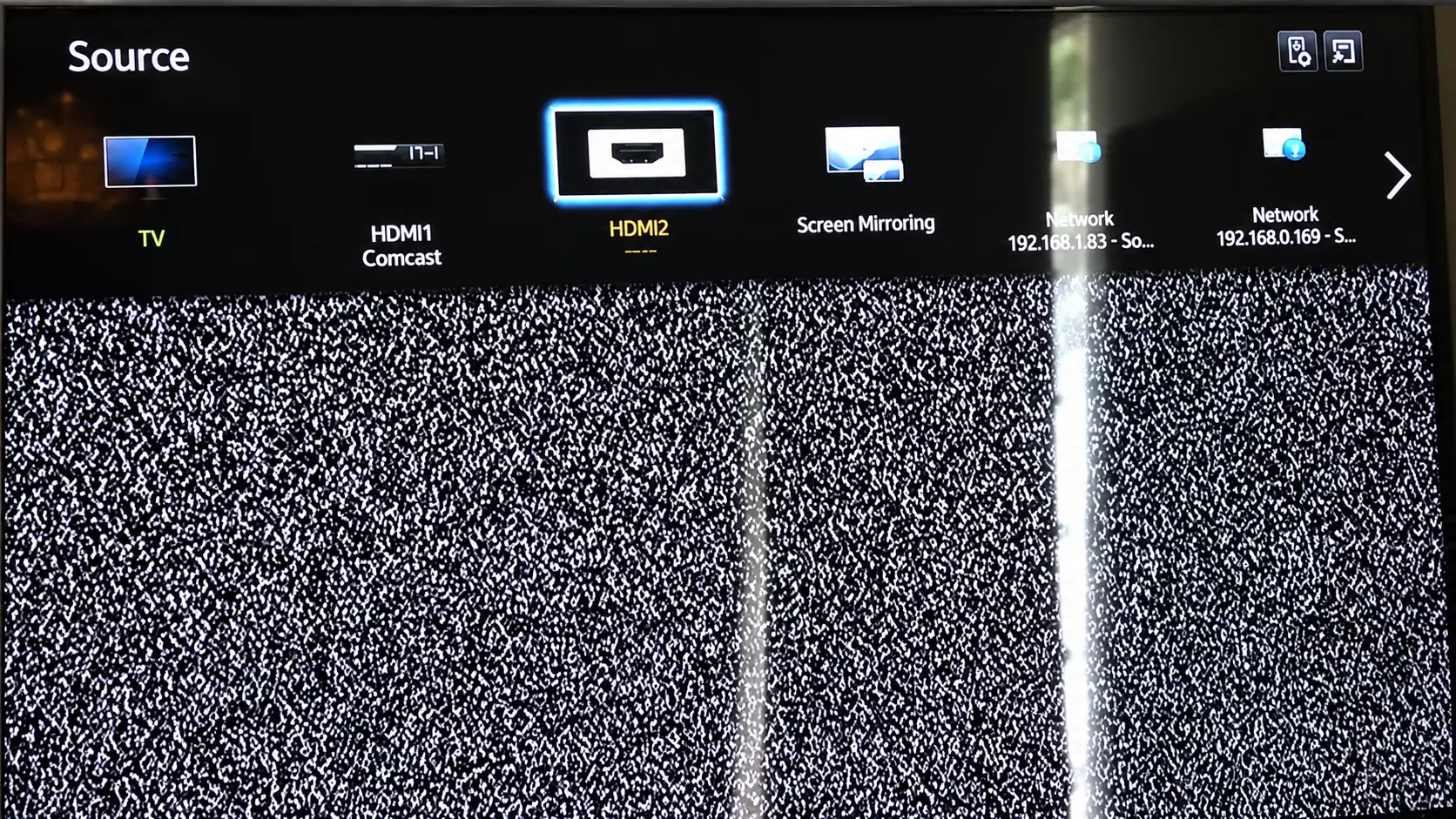 TV Source menu with HDMI2 selected, alongside TV, HDMI1, Screen Mirroring, and network input options